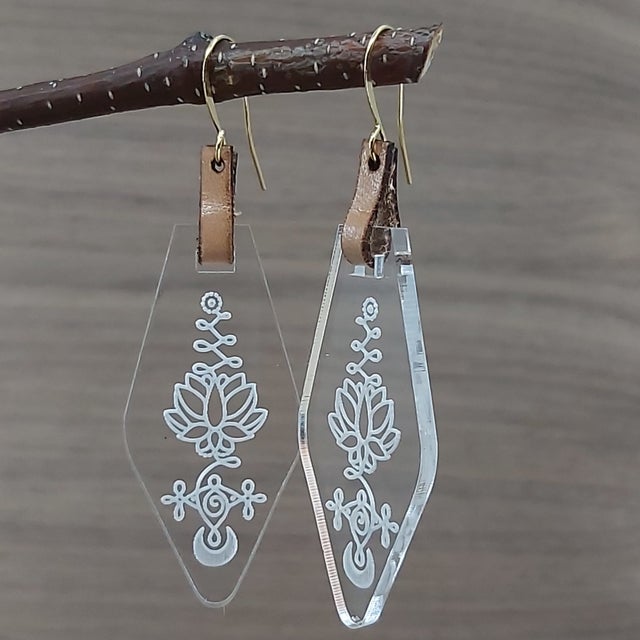Lasercut Earrings with mixed media materials CUSTOM options Home of Avedonia Art Custom Design Production Studio Boutique Leather Wooden and Acrylic creations. Custom Signage Gifts Branded Merchandise...